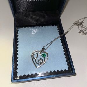 silver Amor Aime heart stethoscope with emerald necklace